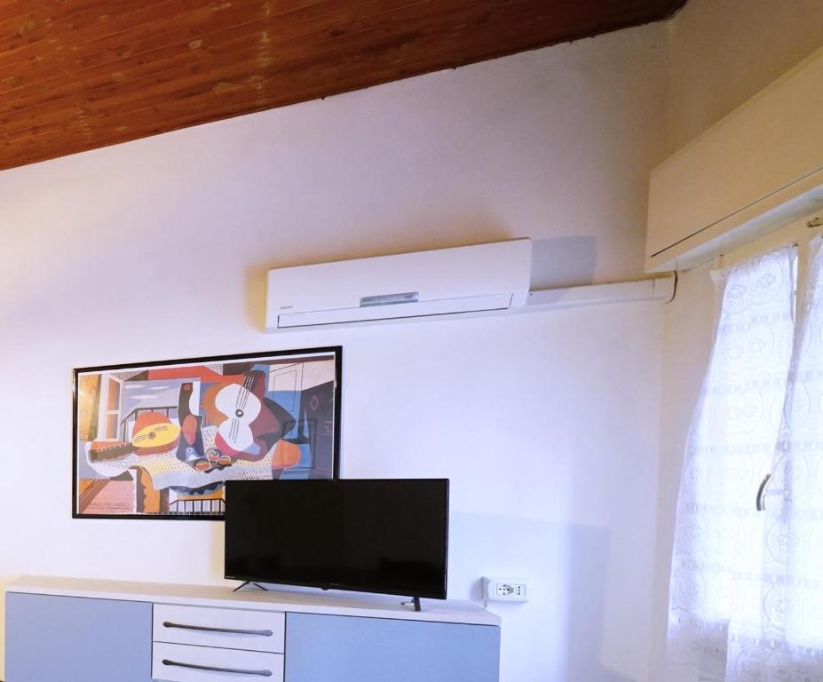 TV a/nebo společenská místnost v ubytování Villetta 2C