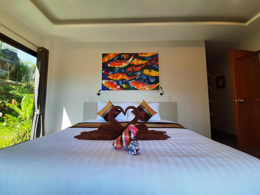 Postel nebo postele na pokoji v ubytování Baan Sawan Samui Resort