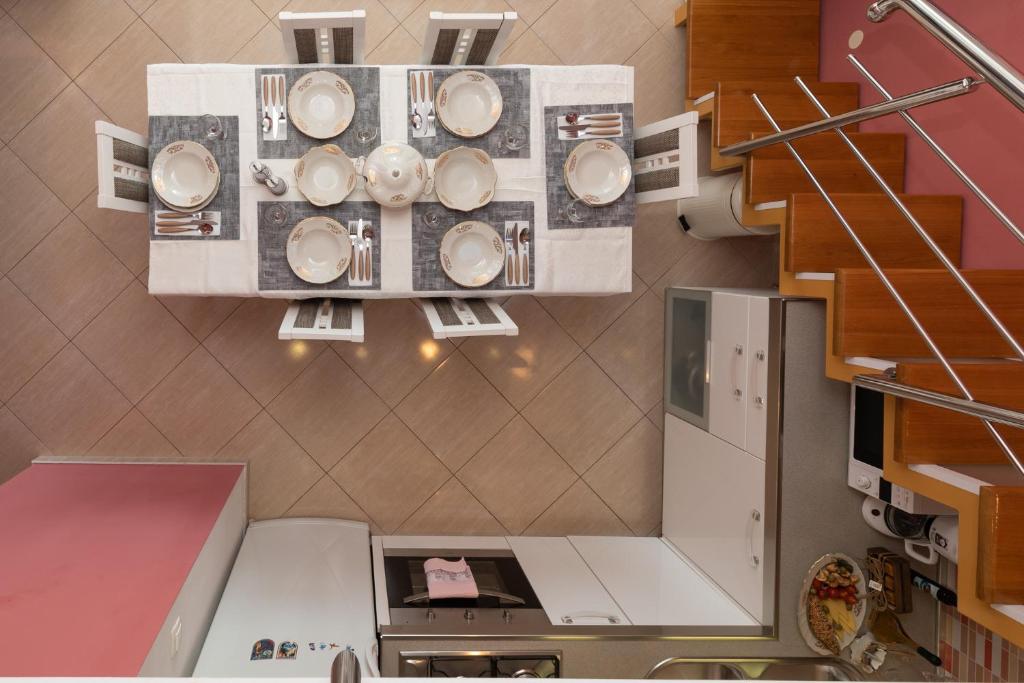 Kuchyňa alebo kuchynka v ubytovaní Apartman Monika
