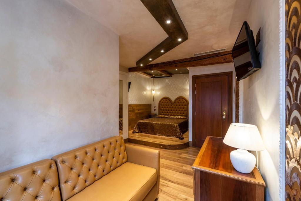 TV a/nebo společenská místnost v ubytování Hotel Abbazia