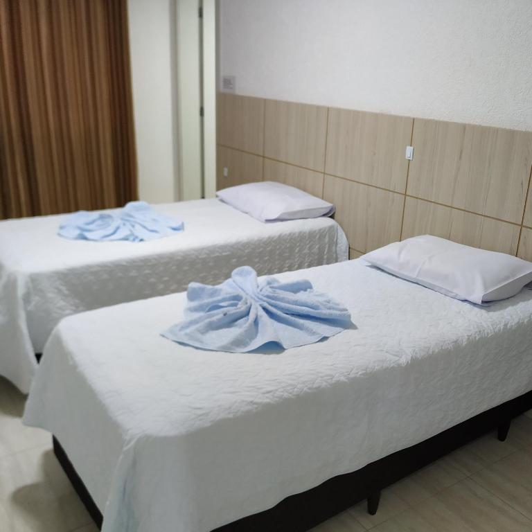 Postel nebo postele na pokoji v ubytování Hotel Dove