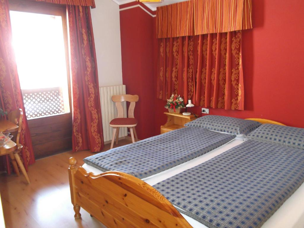 Postel nebo postele na pokoji v ubytování Hotel Adele