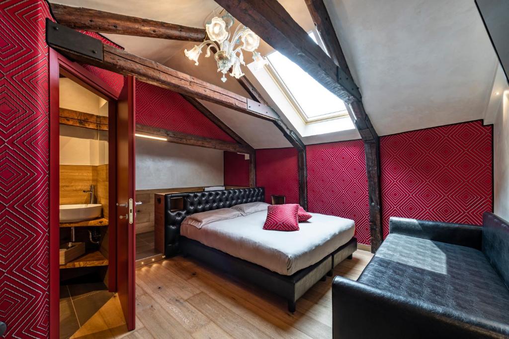 Postel nebo postele na pokoji v ubytování Hotel Abbazia