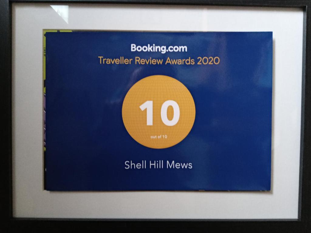 a framed picture of a sign with the number at Shell Hill Mews in Coleraine