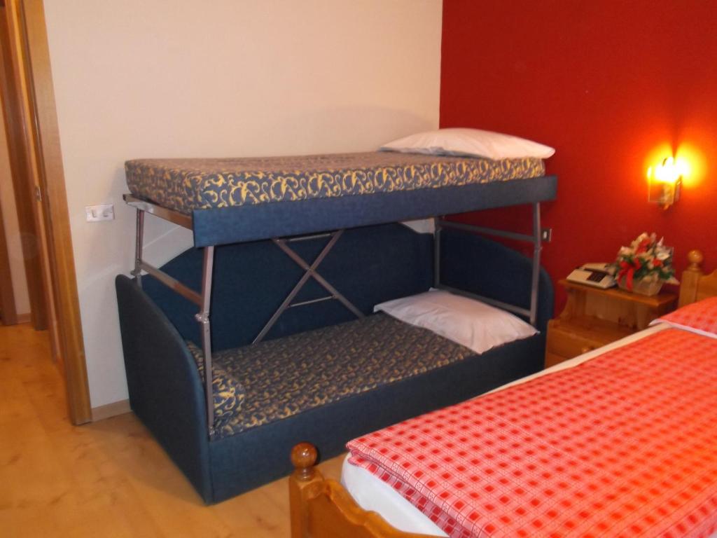 Postel nebo postele na pokoji v ubytování Hotel Adele