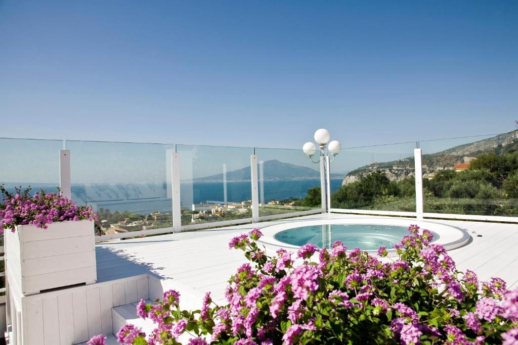 a view from a balcony overlooking the ocean at Villa Oriana Relais in Sorrento