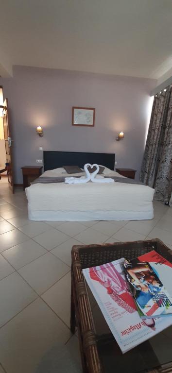 Postel nebo postele na pokoji v ubytování Atlantic Maio Hotel