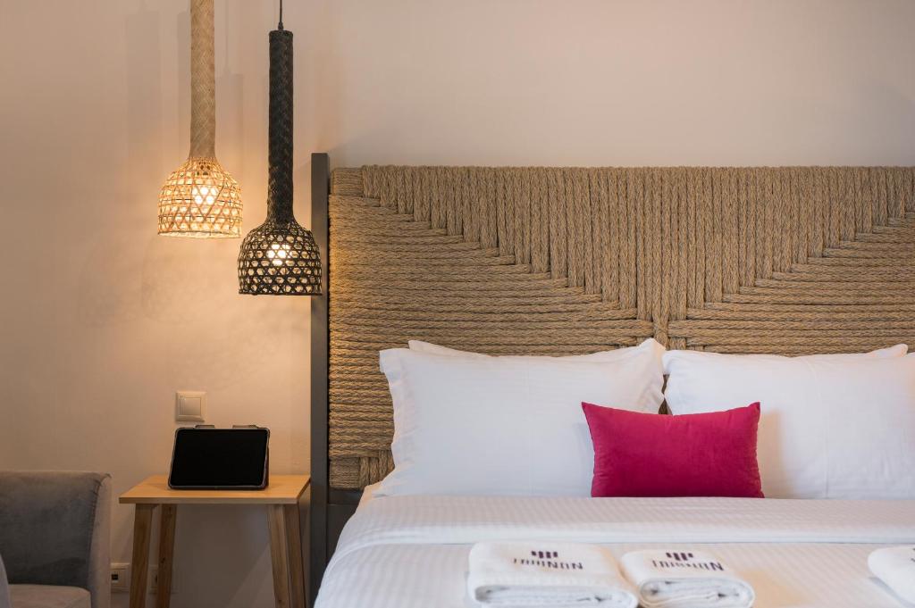 Posteľ alebo postele v izbe v ubytovaní Trianon Luxury Apartments & Suites