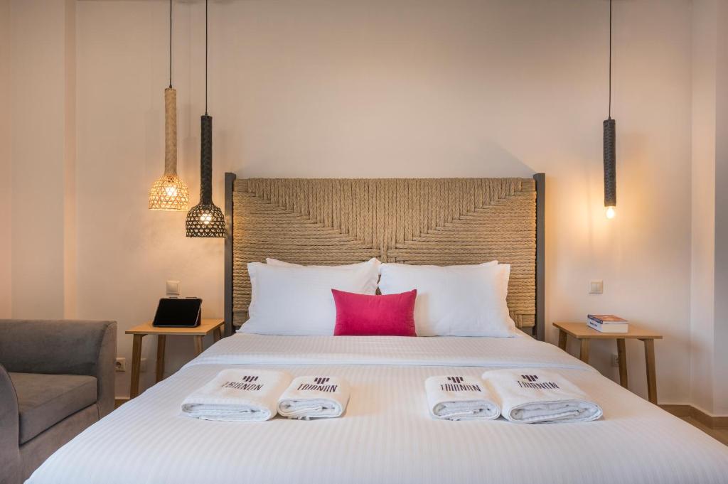 Posteľ alebo postele v izbe v ubytovaní Trianon Luxury Apartments & Suites