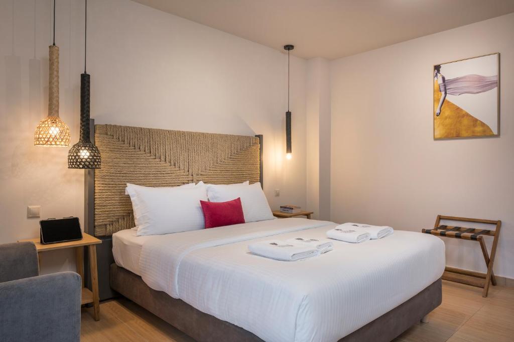 Posteľ alebo postele v izbe v ubytovaní Trianon Luxury Apartments & Suites