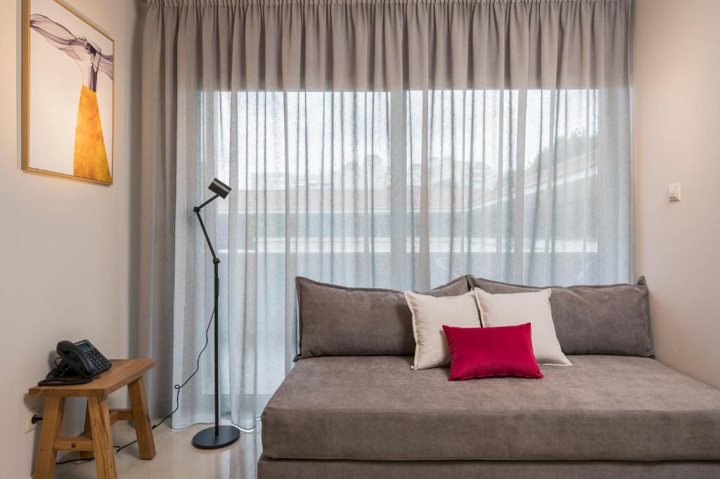 Posedenie v ubytovaní Trianon Luxury Apartments & Suites