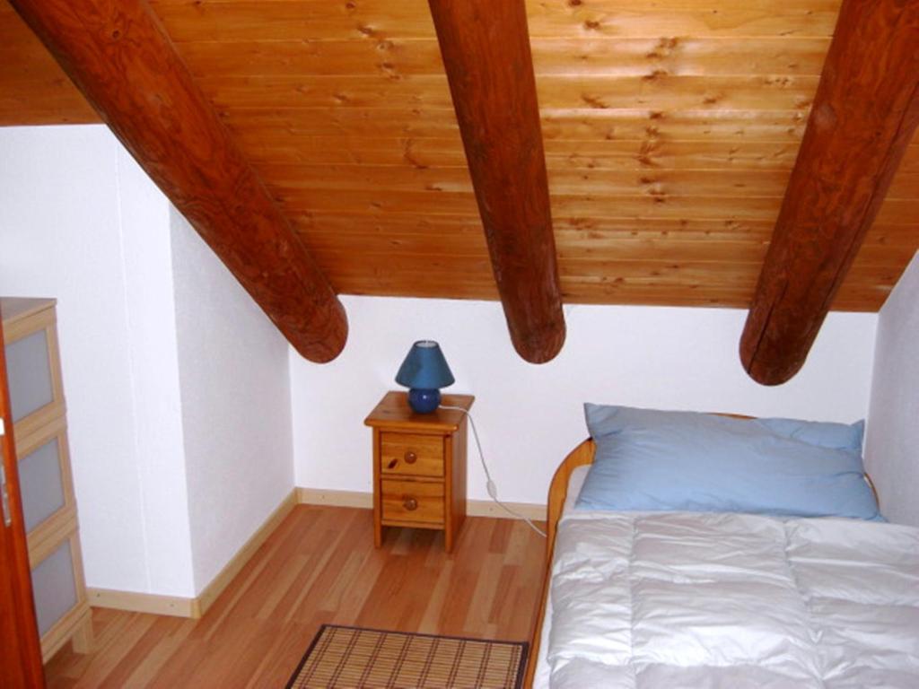 Postel nebo postele na pokoji v ubytování Agriturismo Cantina Carrara