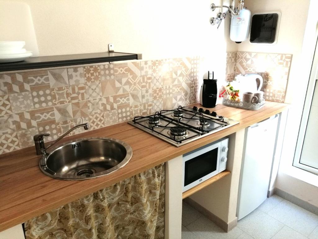 Kuchyň nebo kuchyňský kout v ubytování DUCEZIO rooms