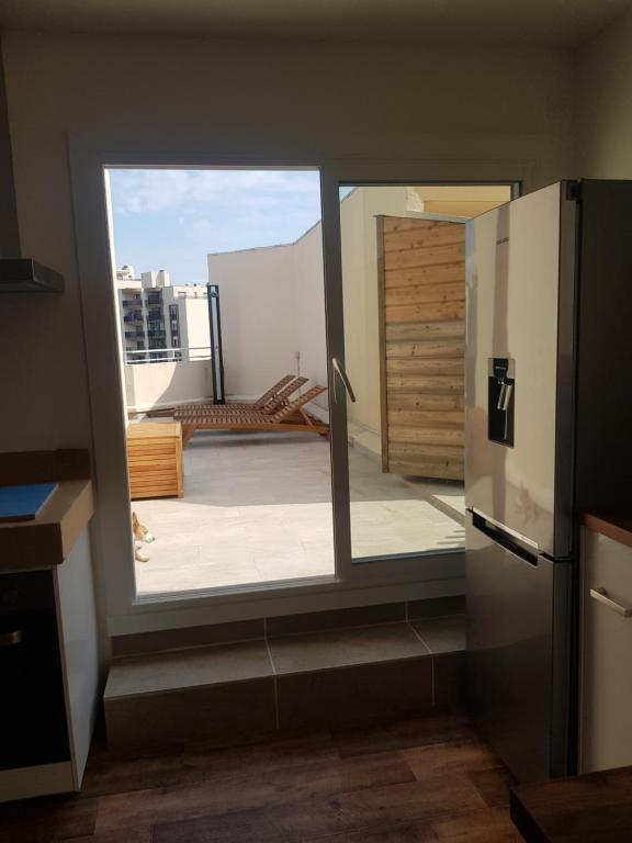 Appartement toit terrasse 2 chambres - Three-Bedroom Apartment