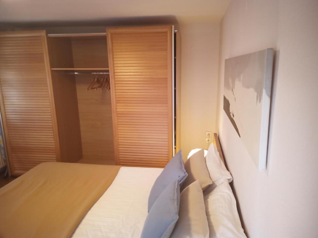 Łóżko lub łóżka w pokoju w obiekcie Plateia Apartments (Katerina)
