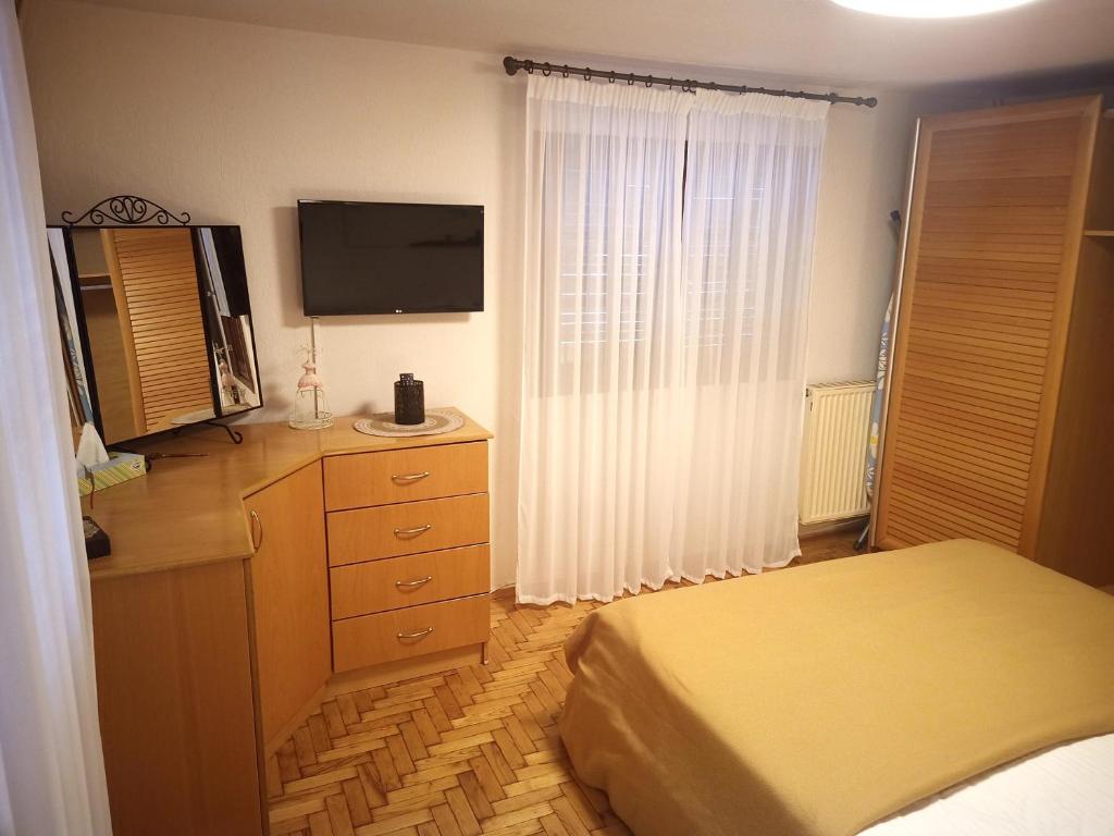 Łóżko lub łóżka w pokoju w obiekcie Plateia Apartments (Katerina)