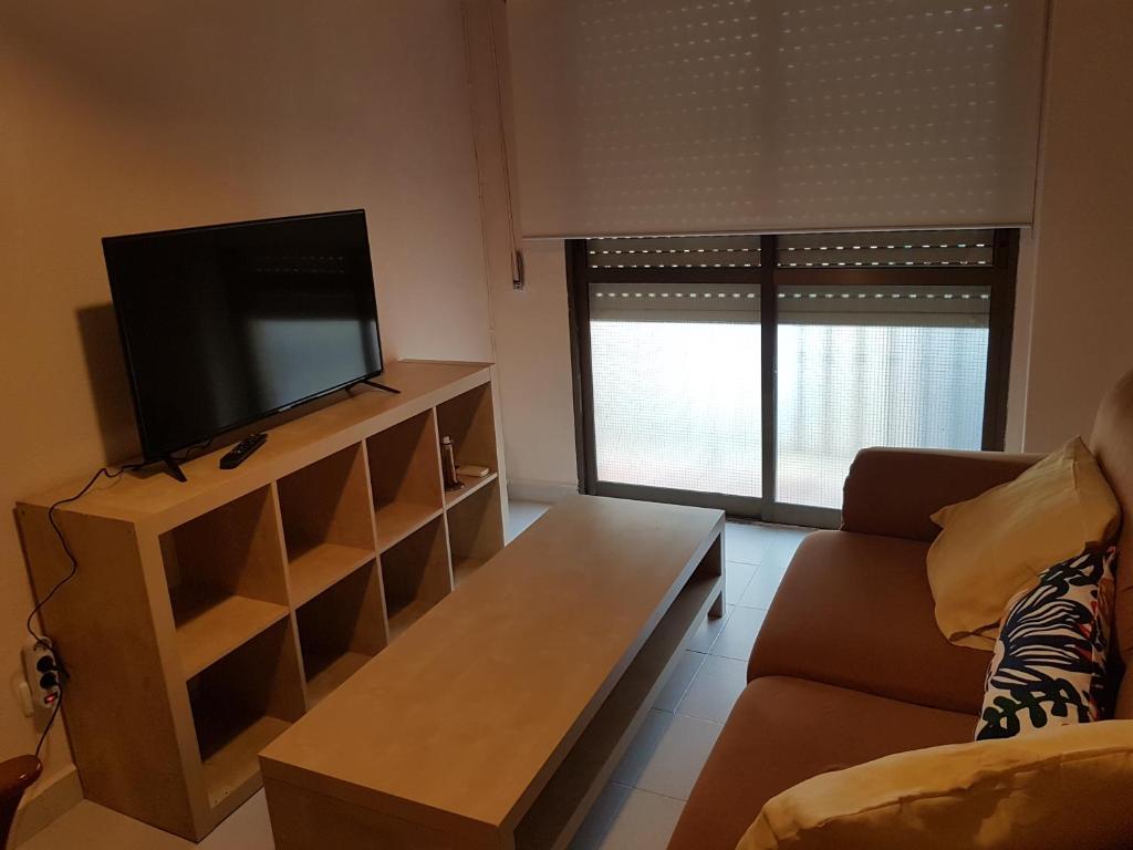 TV a/nebo společenská místnost v ubytování APARTAMENTO LOS BÚHOS