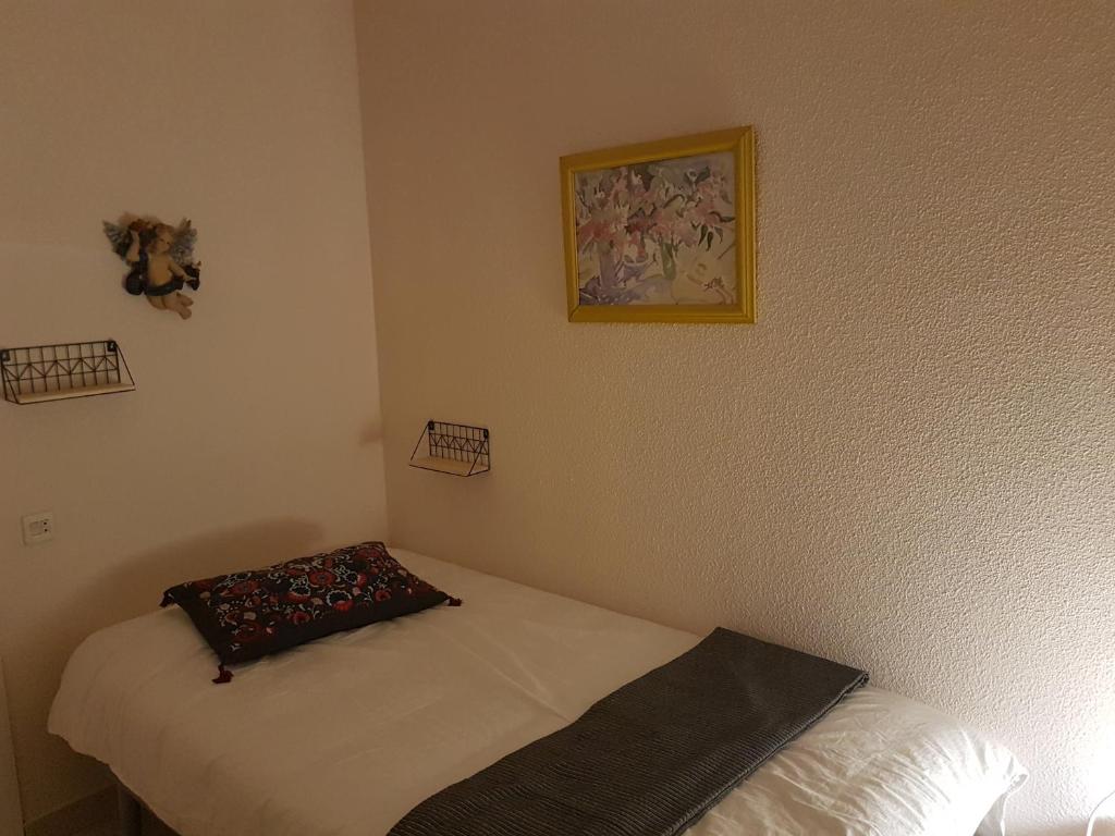 Postel nebo postele na pokoji v ubytování APARTAMENTO LOS BÚHOS