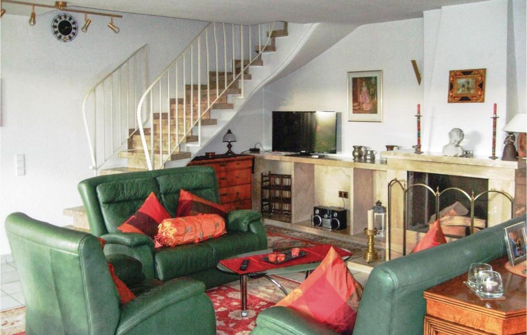 Μια τηλεόραση ή/και κέντρο ψυχαγωγίας στο Nice Apartment In E-38644 Goslar