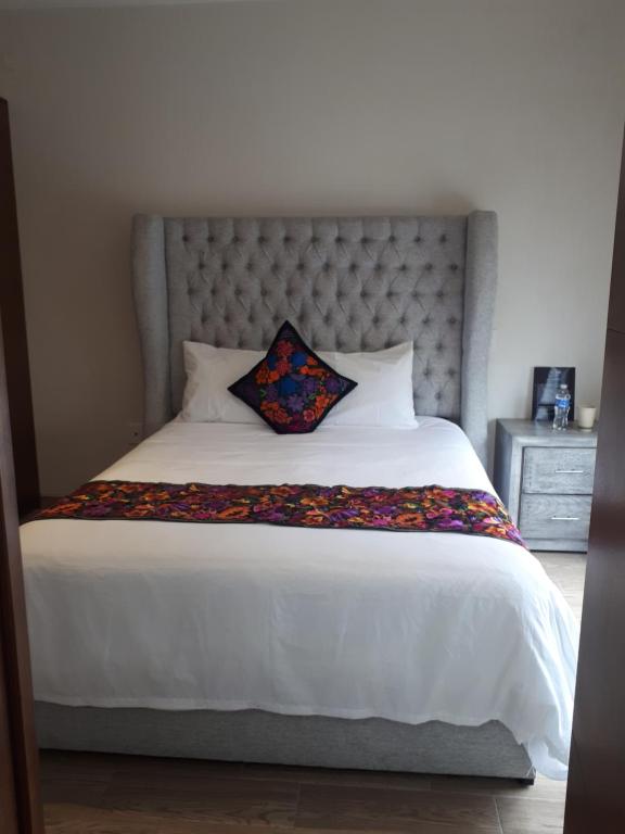 Postel nebo postele na pokoji v ubytování Hotel Del Valle