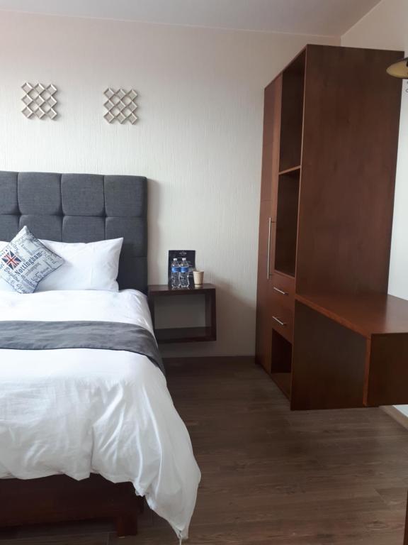 Postel nebo postele na pokoji v ubytování Hotel Del Valle