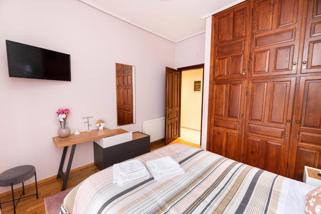 Posteľ alebo postele v izbe v ubytovaní Palazzo di Meteora