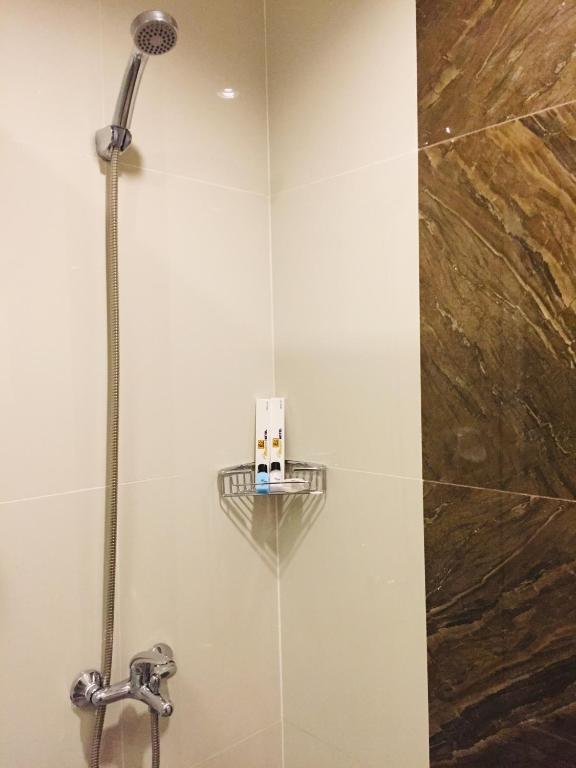 Koupelna v ubytování MAISON HOTEL