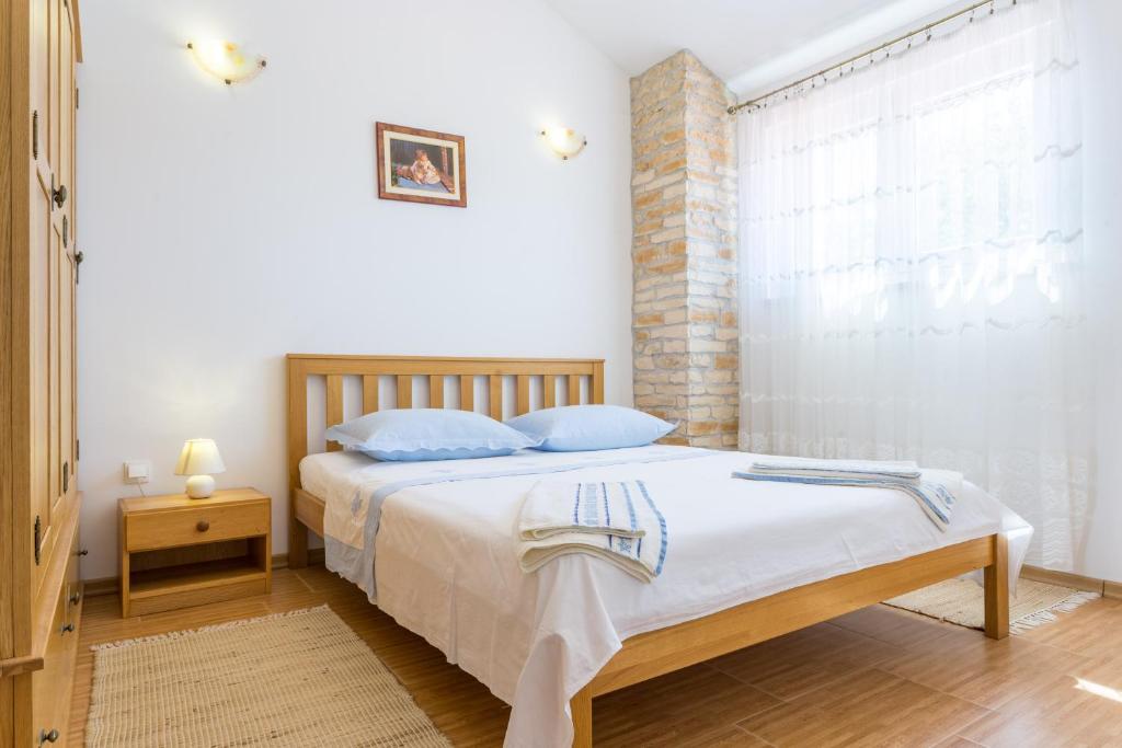 Posteľ alebo postele v izbe v ubytovaní Vila Milančić - a house for memorable holiday in Imotski