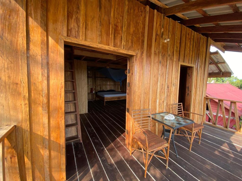 Balkón nebo terasa v ubytování Dragonfly Guesthouse M'Pai Bay