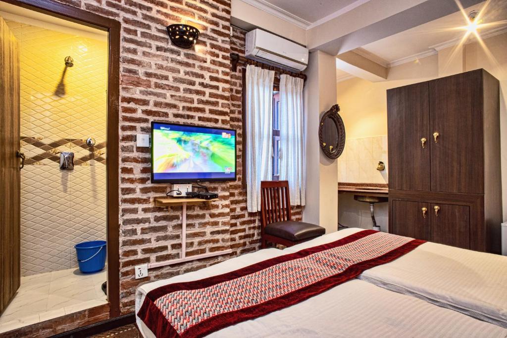 Postel nebo postele na pokoji v ubytování Newa Home