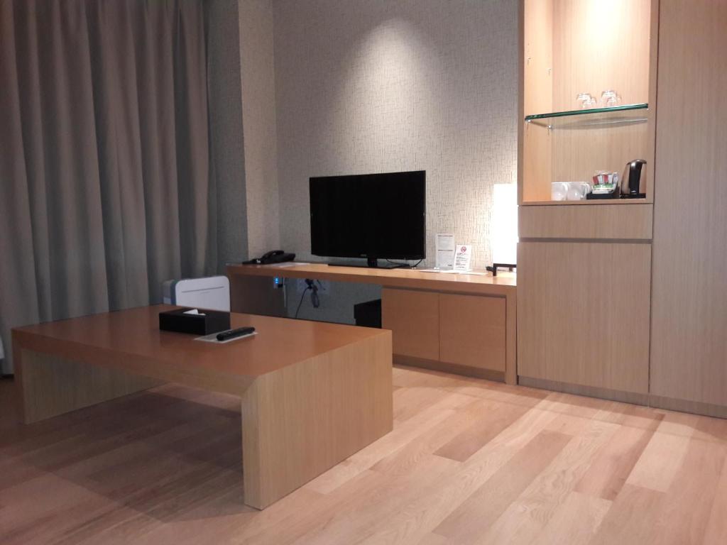 TV a/nebo společenská místnost v ubytování Solaria Nishitetsu Hotel Busan
