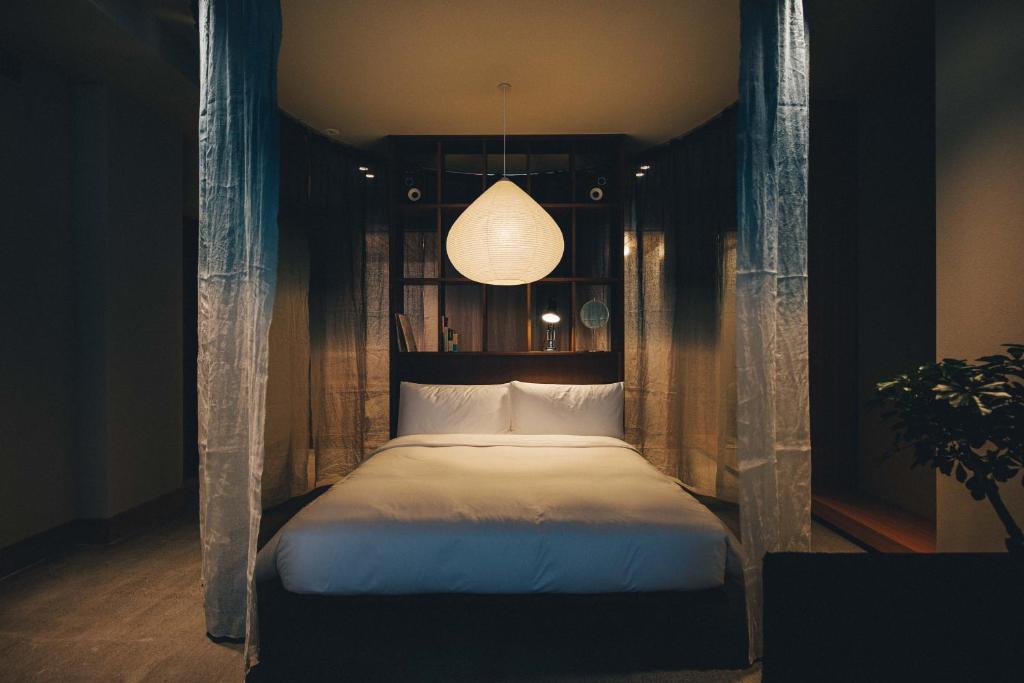 Postel nebo postele na pokoji v ubytování Hotel K5