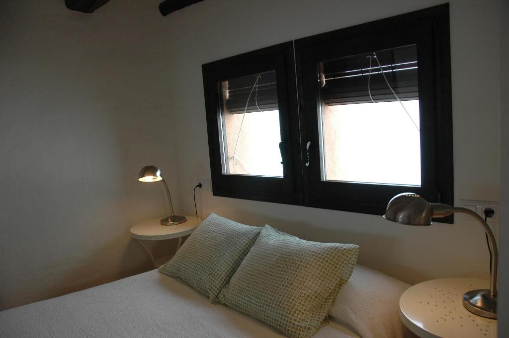Postel nebo postele na pokoji v ubytování Habitaciones con encanto - Cal Alejandro
