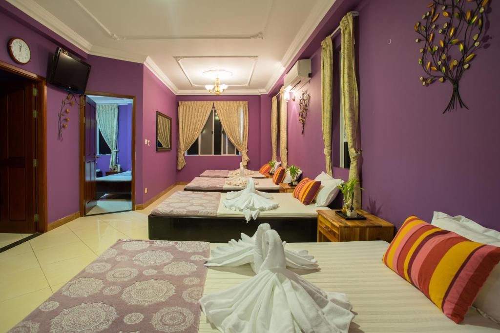 Postel nebo postele na pokoji v ubytování MekongView 1 CondoTel