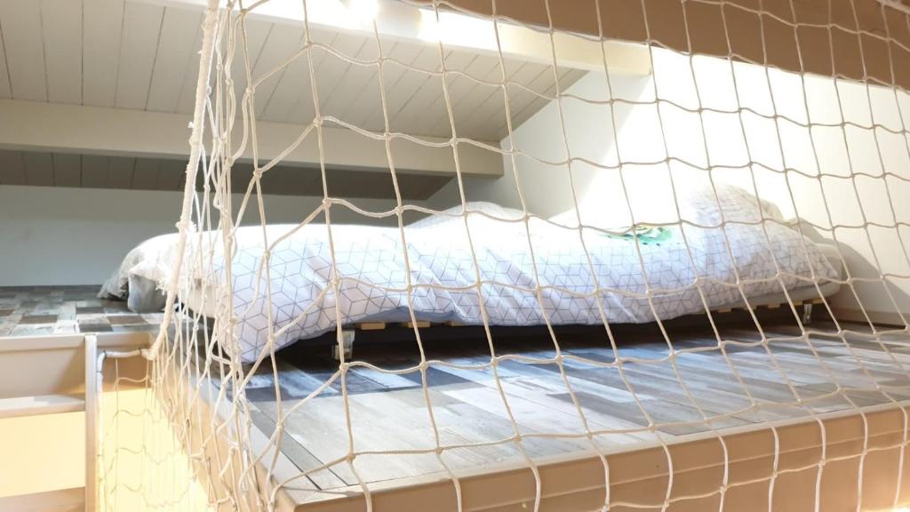 Postel nebo postele na pokoji v ubytování Rélocation vacances de la cote sauvage