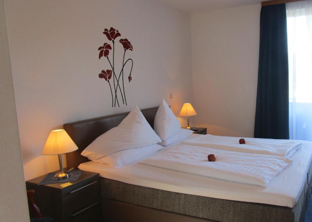 Voodi või voodid majutusasutuse Hotel Klein - Seebodenerhof toas