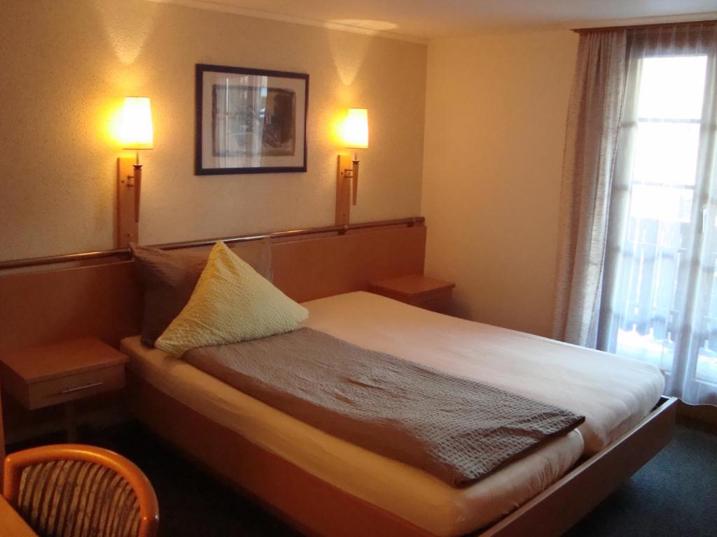 Postel nebo postele na pokoji v ubytování Hotel Restaurant Alpenblick