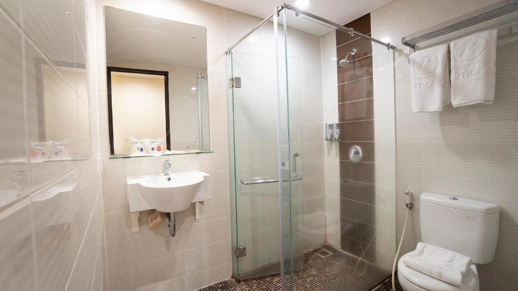 Koupelna v ubytování d'primahotel Airport Jakarta 1