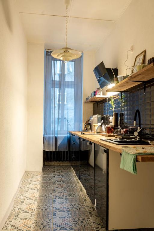 Kuchyňa alebo kuchynka v ubytovaní Apartament Hygge Monte Cassino 4
