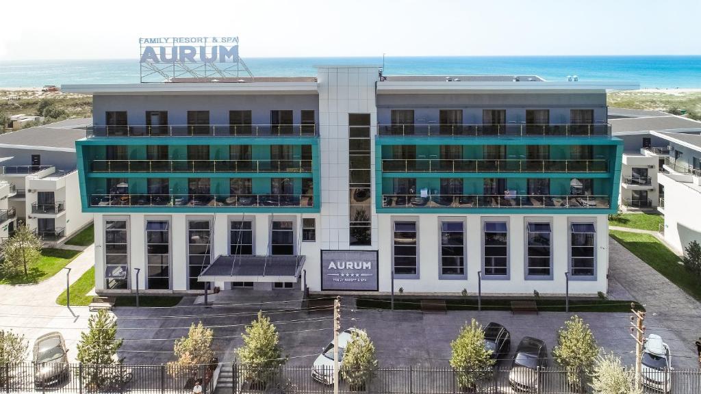 an aerial view of an apartment building with the ocean in the background at AURUM FAMILY RESORT & SPA in Blagoveshchenskaya