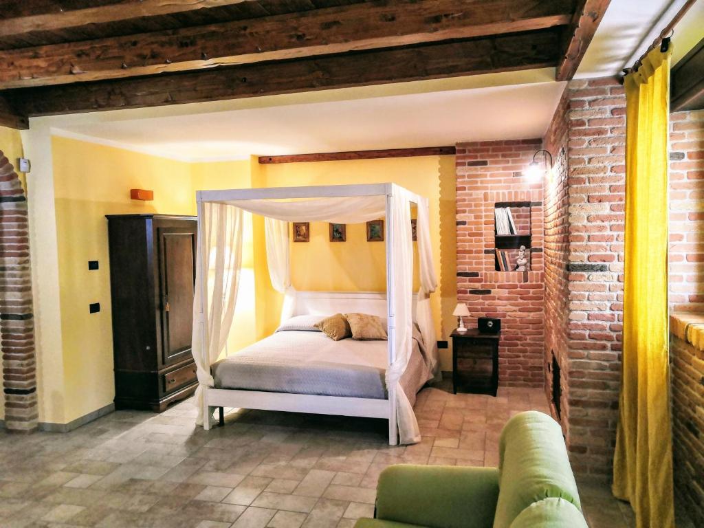 Postel nebo postele na pokoji v ubytování BORGO LUNA b&b