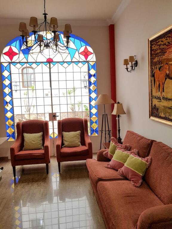 Posezení v ubytování Hotel Plaza Escribano