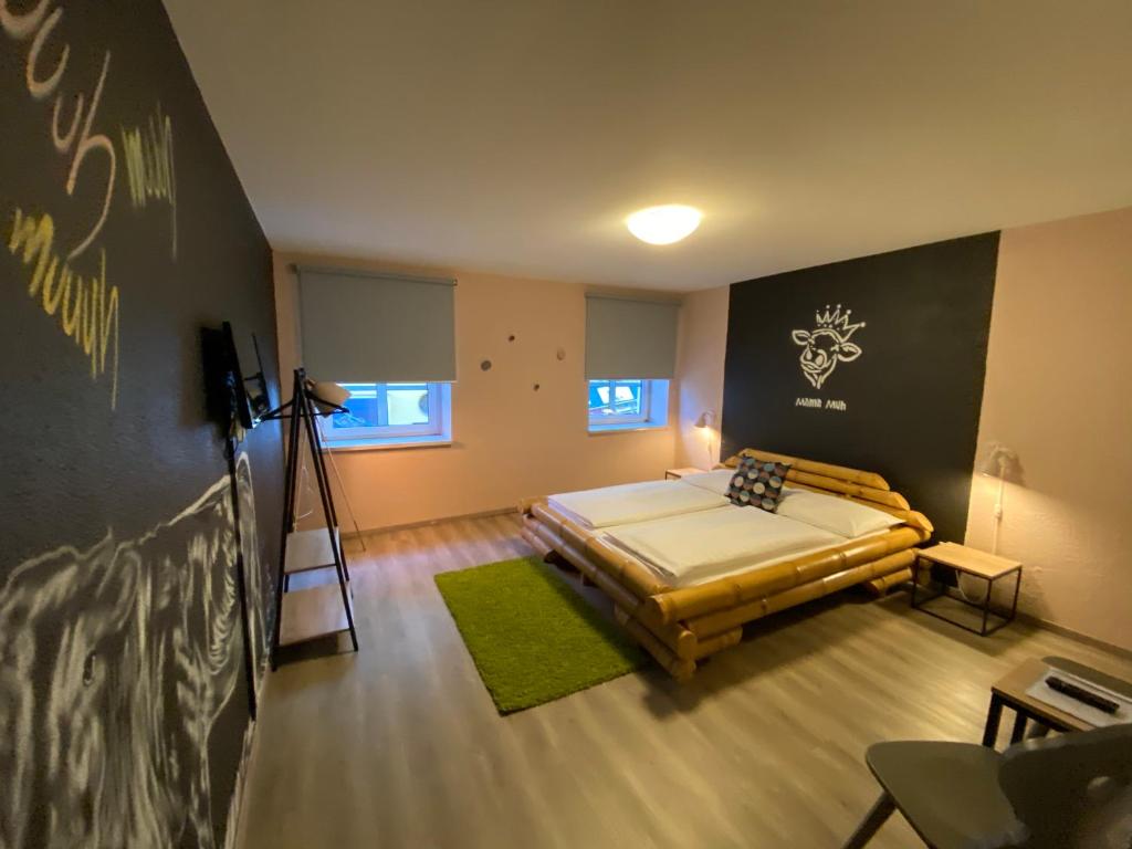 Postel nebo postele na pokoji v ubytování Mama Muh Self-Check-in