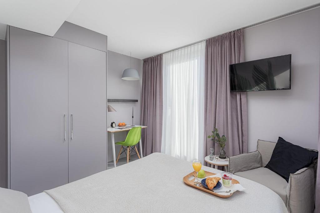 Postel nebo postele na pokoji v ubytování VISIONAPARTMENTS Lucerne - contactless check-in