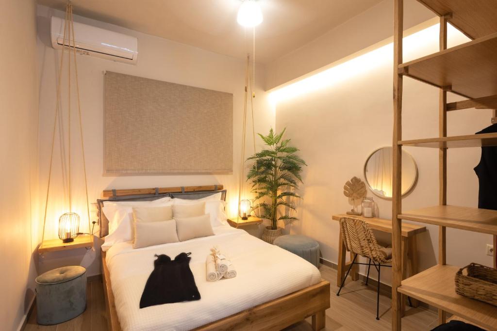 Posteľ alebo postele v izbe v ubytovaní Palm Luxury Studios