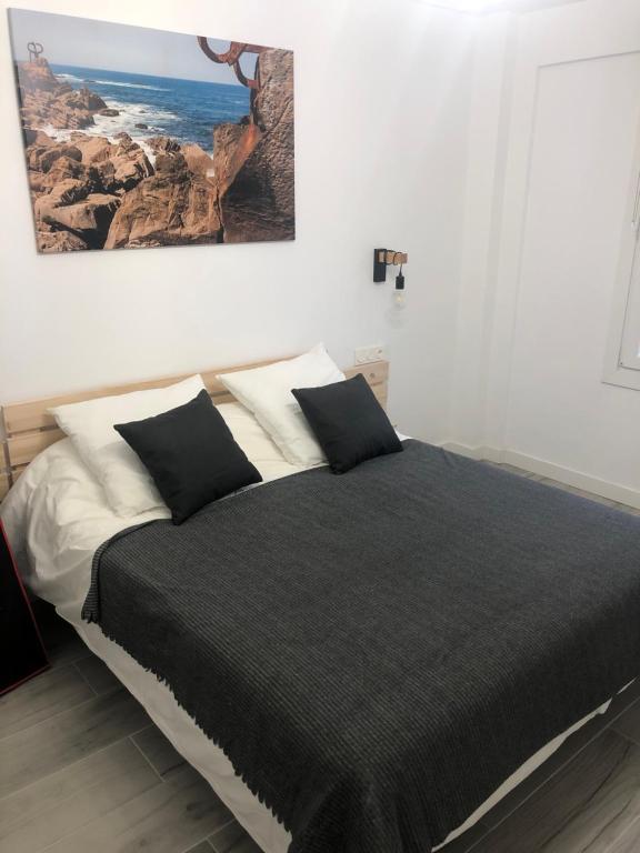 Postel nebo postele na pokoji v ubytování AMARA PIO XII PARKING 15E night WIFI TERRACE