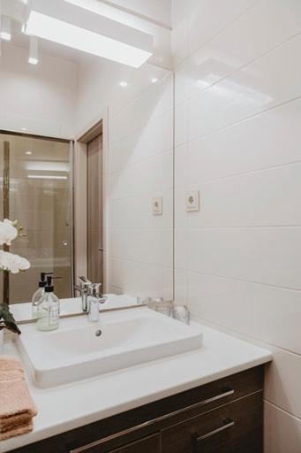 Kúpeľňa v ubytovaní Kényelmes apartman a belváros szélén