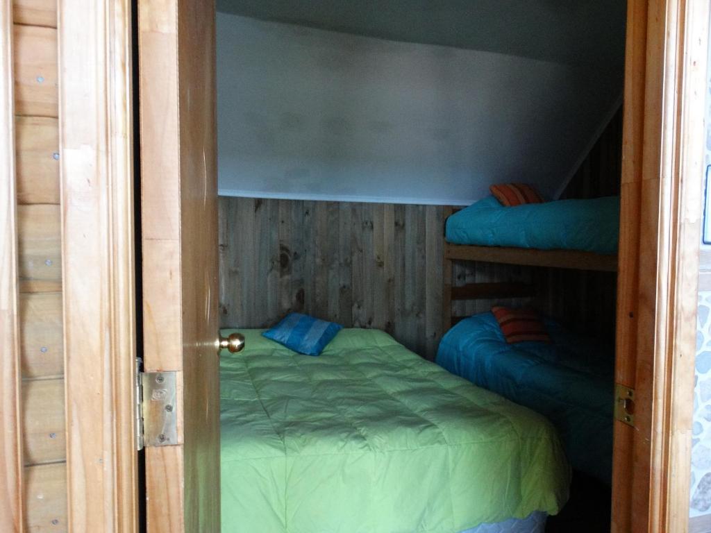 Postel nebo postele na pokoji v ubytování CABAÑAS SAKAR