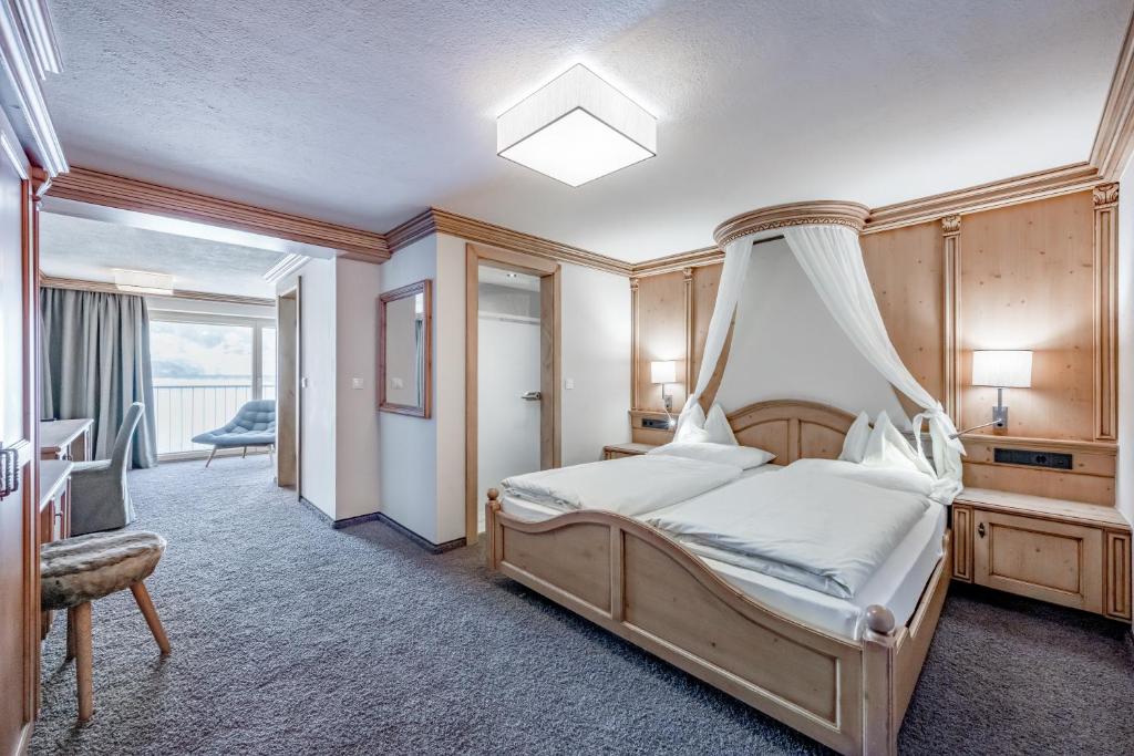 Postel nebo postele na pokoji v ubytování Hotel Regina