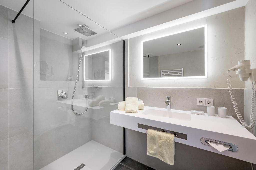 Koupelna v ubytování Hotel Regina